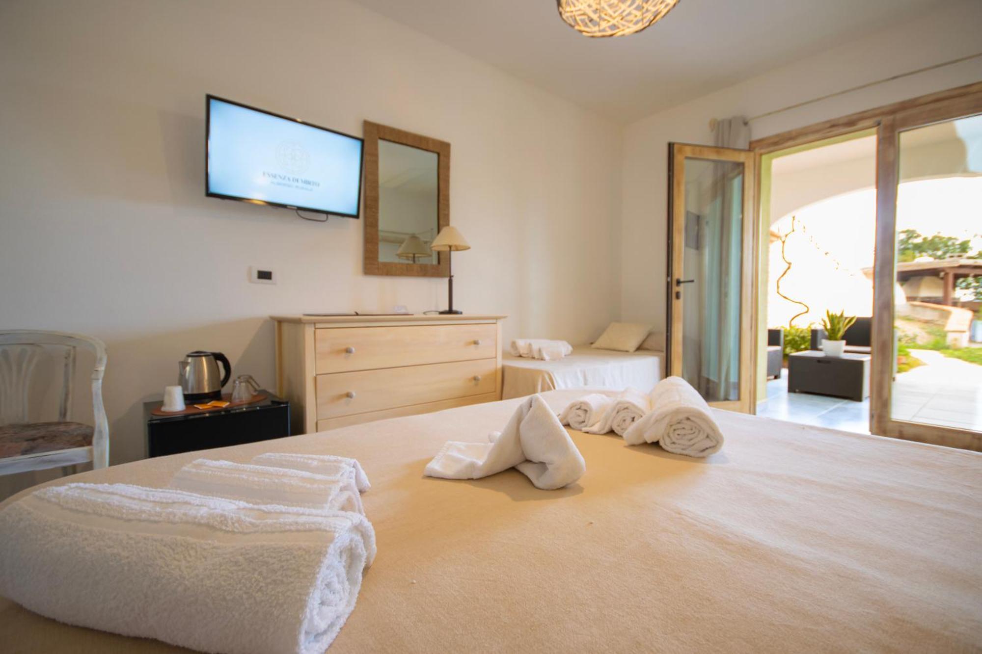 Hotel Essenza Di Mirto La Caletta Habitación foto